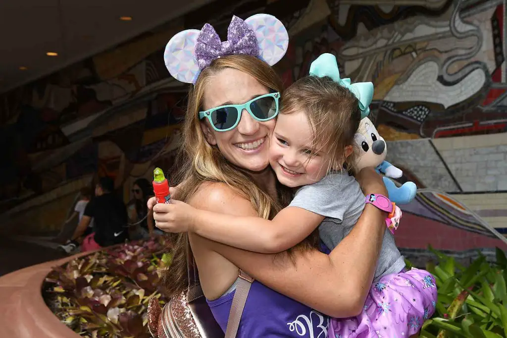 Chloe hugging her momma at Disney World!