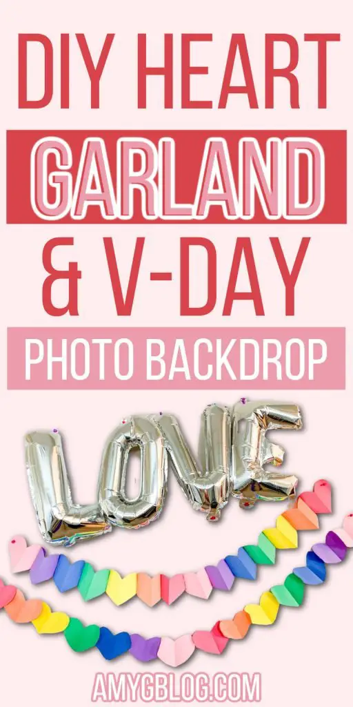 Create this super simple Valentine's photo backdrop by letting your kids help you make some DIY heart garland! It's a super simple Valentine's craft for kids and toddlers plus it's fun for everyone!