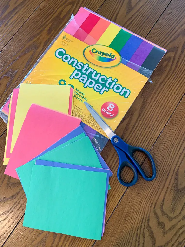 Construction paper and supplies needed for DIY heart garland