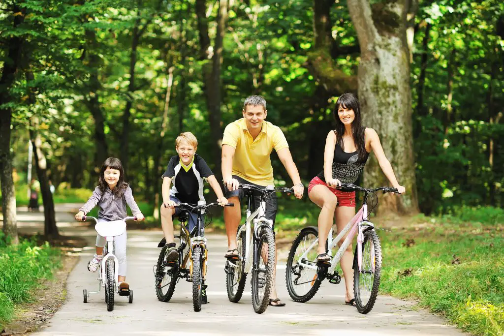 Family bike ride in the spring